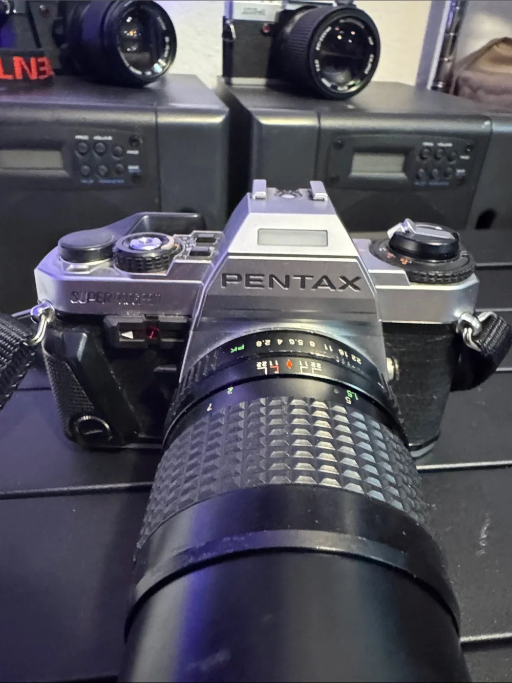 Pentax Silver and Black SLR with 135mm Telephoto Lens